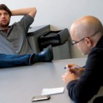 คนเอาขาพาดโต๊ะคือ Andrew Mason และ Chief Technology Officer :Ken Pelletier